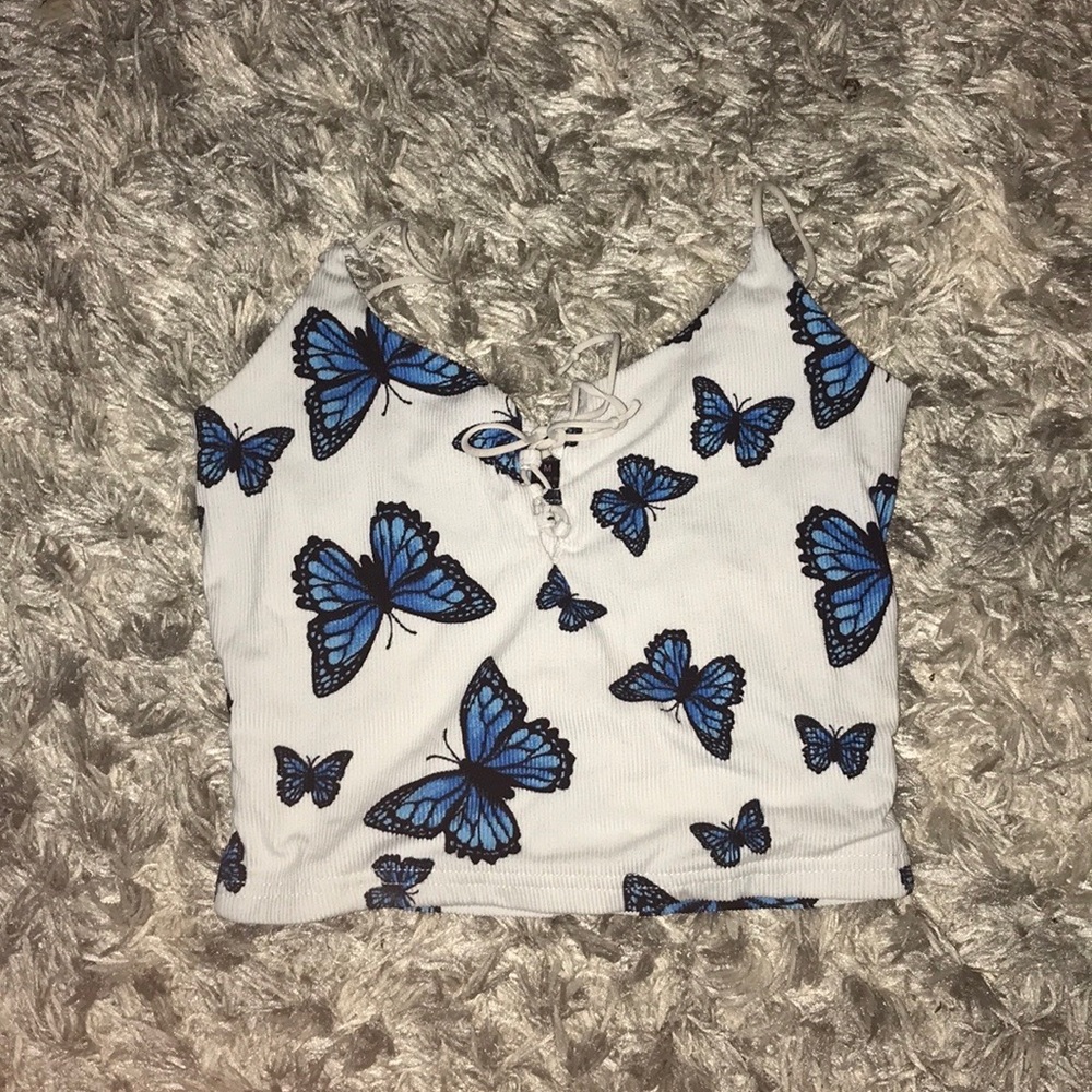 Black and blue butterfly it’s a medium!! It fits to size!
